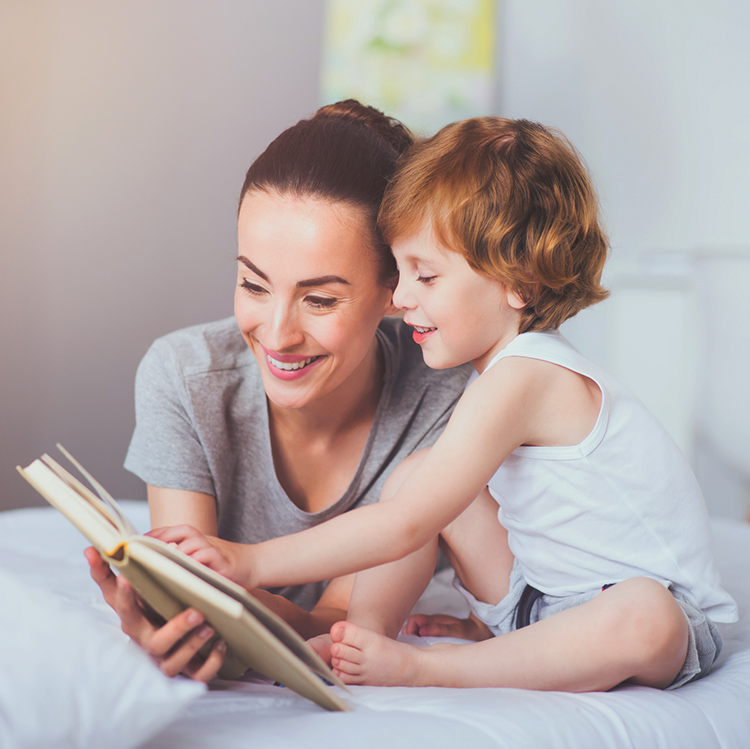 Mother reading with child