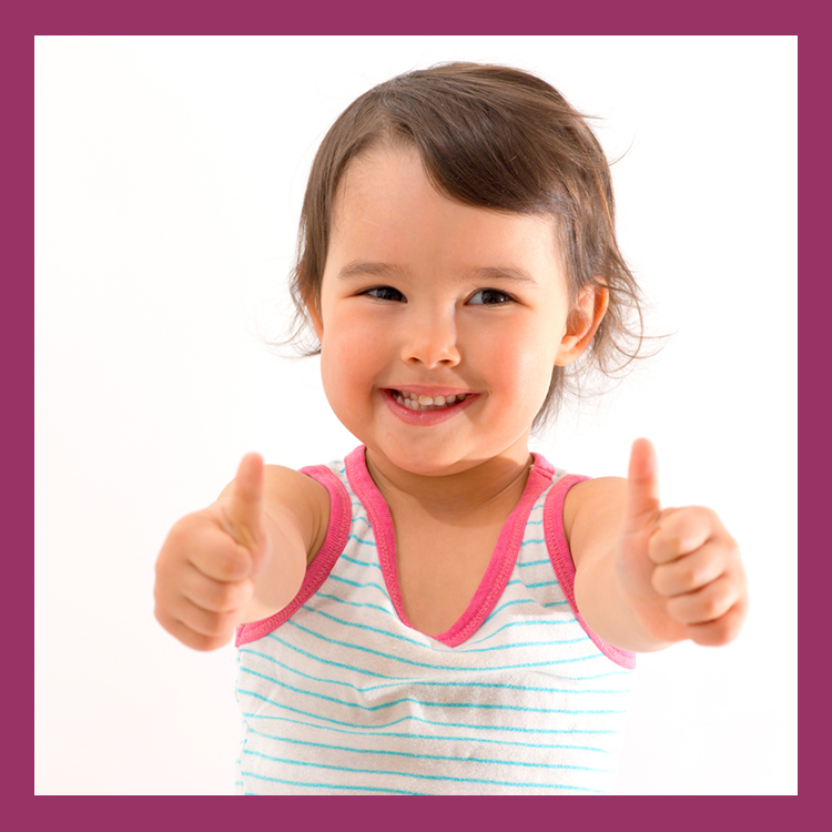 Toddler giving thumbs up encouragement